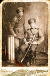 Фотопортрет парный на паспарту. Братья С. и А. Чегодаевы, казаки Забайкальского казачьего войска. 18 мая 1915 г.